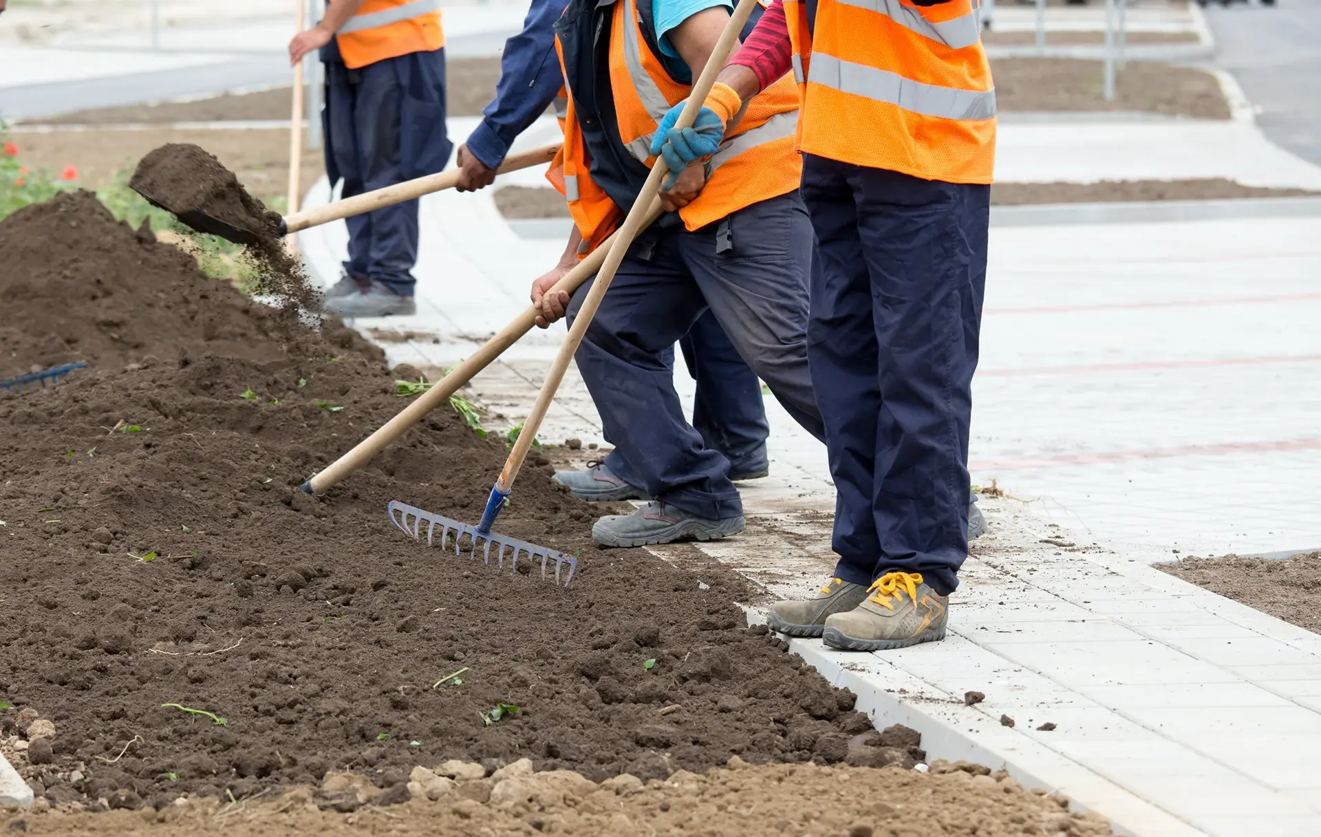 Landscape labourers grading a final grade in Edmonton