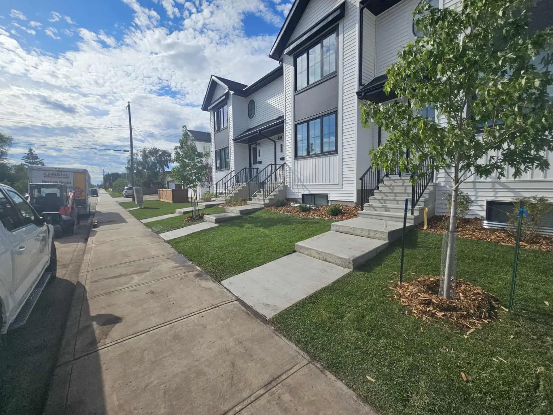 4-plex front yard meeting minimum landscaping requirements, Edmonton