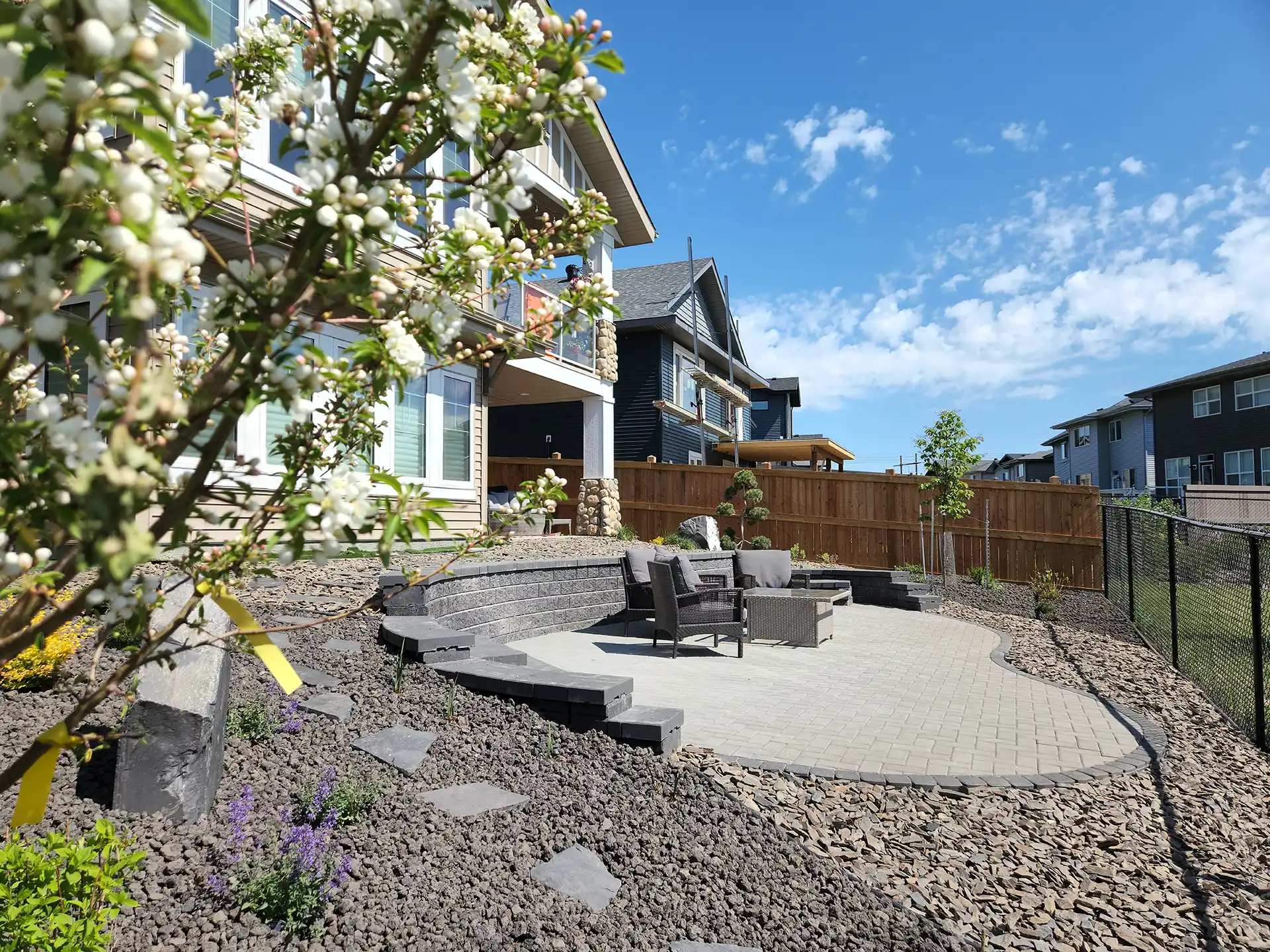 Walkout lot with built-in retaining wall and patio, Edmonton