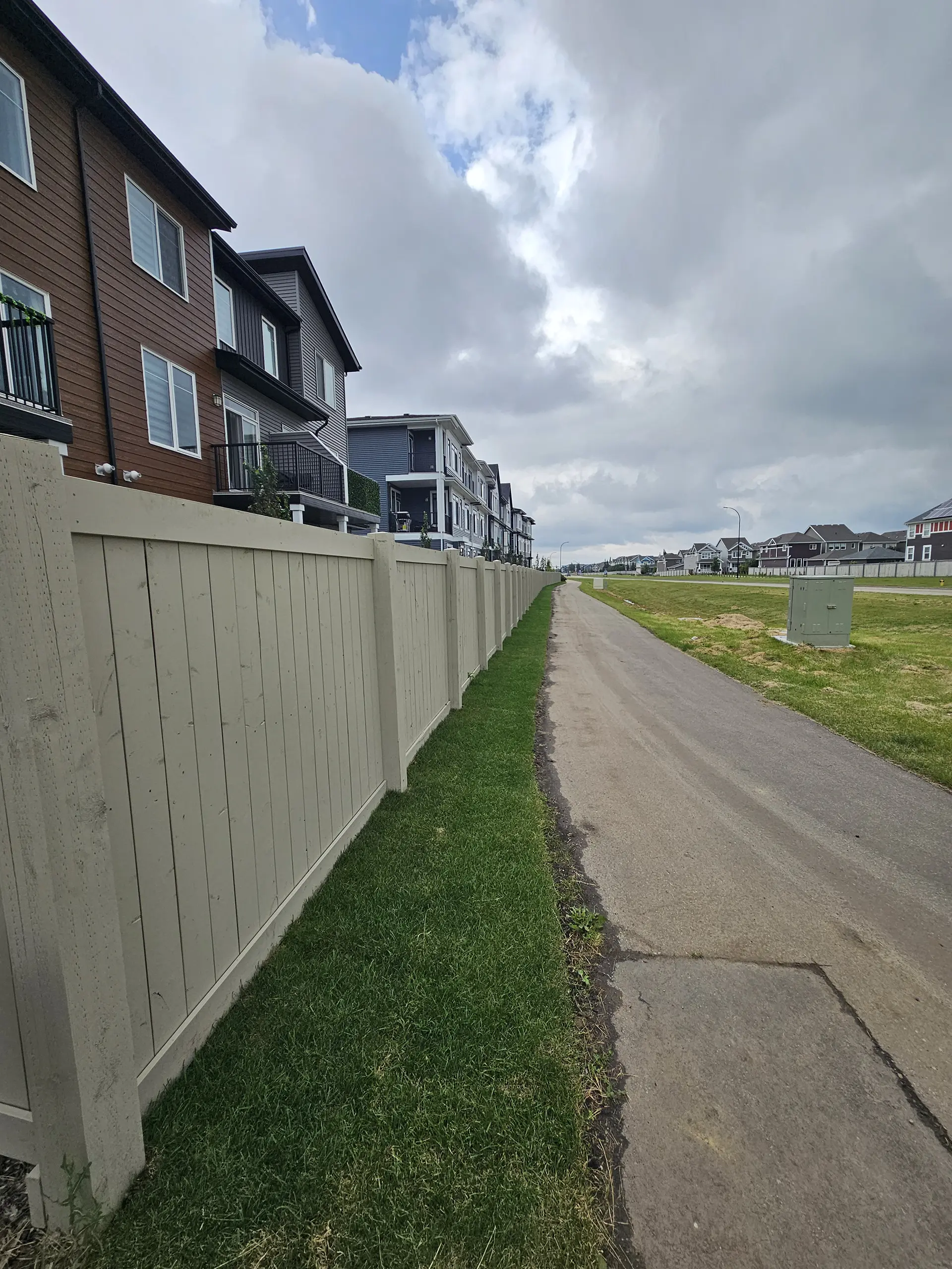 Multi-family stained fencing — Edmonton
